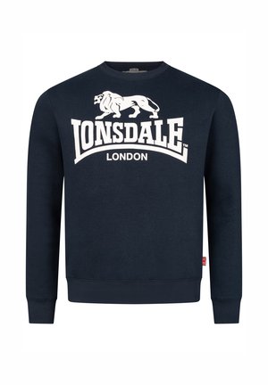 Navy blue sweatshirt made of cotton, featuring a large white graphic logo and lions. Ribbed cuffs and hem. Tag with a Union Jack accent.