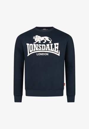 Mørkeblå sweatshirts lavet af bomuld, med et stort hvidt grafisk logo og løver. Ribbet manchetter og nederkant. Etikette med Union Jack-detail.