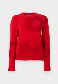 Κόκκινο πουλόβερ με υφή πλεξίματος, στρογγυλή λαιμόκοψη και τολμηρά αφηρημένα μοτίβα σε σκοτεινότερες κόκκινες αποχρώσεις. Ριμπ μανσέτες και τελείωμα.