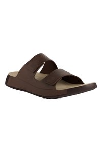 Sandale en cuir marron avec deux brides réglables, tige en synthétique texturé, semelle intérieure rembourrée et semelle extérieure robuste pour une bonne adhérence.