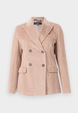 Beige corduroy double-breasted blazer with four dark buttons, two front flap pockets, and a notch lapel collar.