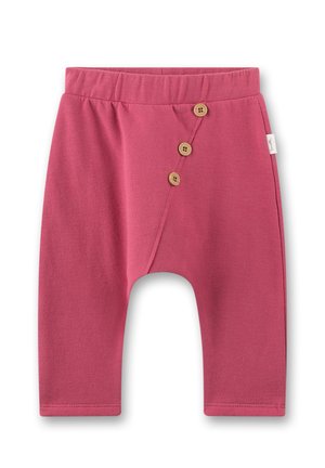 Rosa Kleinkinderhose mit elastischem Bund und drei dekorativen Holzknöpfen entlang einer diagonalen Naht auf der Vorderseite.