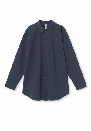 Navy blue long-sleeve shirt with a pointed collar, button front, and an embroidered logo on the chest; made of smooth fabric.