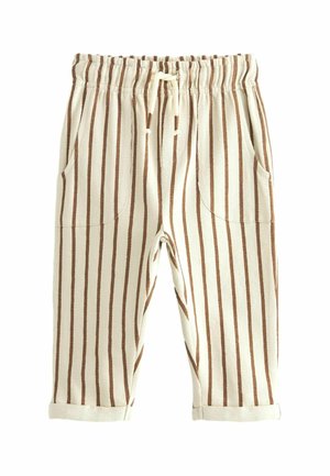 Pantalon couleur crème avec rayures verticales marron, taille élastique avec cordon de serrage, poches latérales et revers de jambes retroussés.