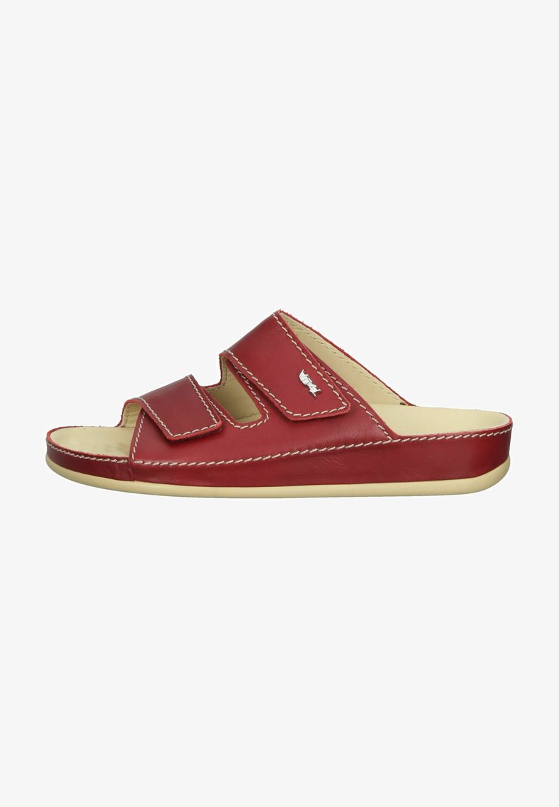 Red leather slide sandals with two adjustable Velcro straps, cream-colored sole, white stitching, and open-toe design.
