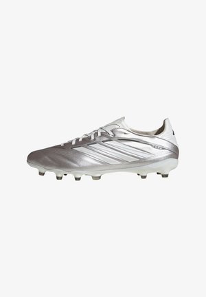Silver Adidas Copa football boot with white stripes, laces, and studs on a clean white background.
