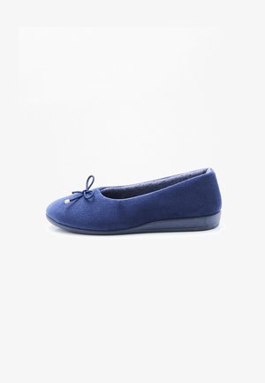 Zapatilla de ballet plana azul marino con tela suave, suela acolchada y pequeño lazo en la parte delantera.