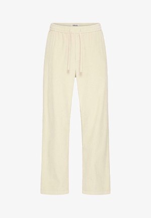 Vaffelstrukturert, kremfargede bukser med elastisk liv og snor, med rette ben og sømmene sydd.