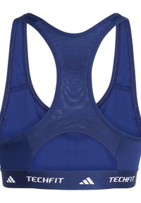 Športni nedrček temno modre barve z dizajnom z racerback hrbtom, teksturirano mrežasto ploščo in logotipom TechFit na elastičnem traku. Gladek material s podrobnim šivanjem.