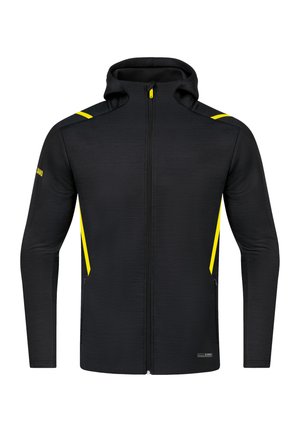 Schwarze ZIP-Jacke mit Kapuze; mit gelben Akzenten an den Schultern und Seiten; aus strukturiertem Stoff; schlankes, modernes Design.