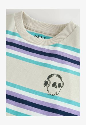 Felpa a righe in cotone color crema, con righe turchesi, viola e navy. Stampa grafica di un teschio con cuffie nella parte anteriore.