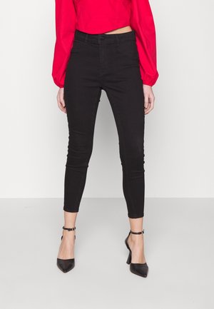 Vaqueros pitillo - black