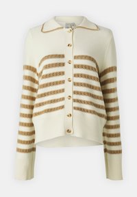 Gebreide cardigan in creme met horizontale bruine strepen. Voorzien van een kraag, knopen aan de voorkant en geribbelde manchetten, met een cropped ontwerp.
