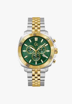 Orologio cronografo con quadrante verde, cinturino in acciaio inossidabile tono oro e argento, lunetta zigrinata e tre sottoquadratini con display della data.
