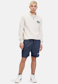 Fila LOUDI GRAPHIC   - Träningsbyxor - black iris