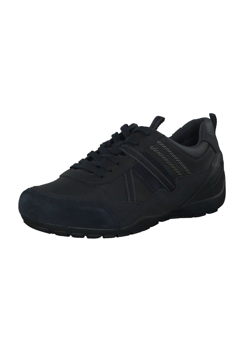 Black athletic shoe with a mix of leather and suede materials, featuring textured upper, laces, and contrasting stitching. Rounded toe and textured sole.