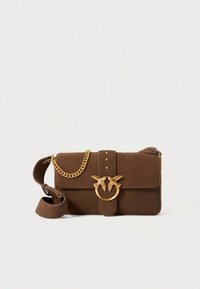 Brown suede handbag with a gold chain strap, flap closure, and a circular hardware accent featuring two bird designs.