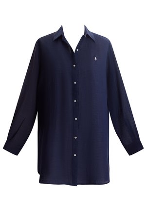 Camicia blu navy in tessuto leggero, con chiusura frontale con bottoni, maniche lunghe e piccolo logo sul petto.