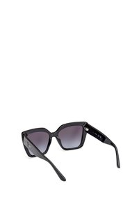 Black cat-eye sunglasses with gradient dark lenses. Features a glossy plastic frame and metal accents on the hinges.
