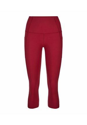 Hoch taillierte, kurze Leggings in dunklem Rot mit seitlichen Taschen und sichtbaren Nähten, entworfen für sportliche oder legere Kleidung.