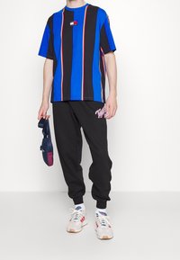 Tommy Jeans Camiseta estampada - blue