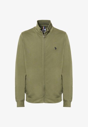Giacca verde oliva con zip e colletto alto, polsini e orlo a costine. Presenta un piccolo logo nero sul petto e una texture liscia.