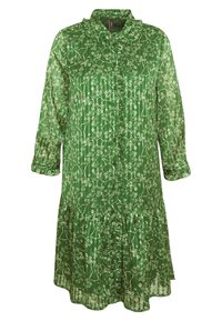 Abito camicia verde a fantasia realizzato in materiale leggero, con bottoni sul davanti, colletto arricciato e dettagli della gonna plissettata.