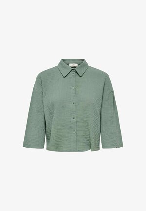 Grüne button-up Hemd aus strukturiertem Stoff. Verfügt über einen Kragen und 3/4-Ärmel. Der Stoff hat eine gesteppte Optik.