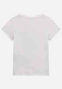 Lyhythihainen, pyöreäkauluksinen t-paita yksinkertaisessa valkoisessa värissä, valmistettu pehmeästä puuvillasta. Sen pinnassa on sileä rakenne ja yksinkertainen, koristamaton muotoilu.