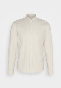 Lichtbeige lange mouw shirt van linnen, met een button-down kraag en een voorkant met knoopsluiting. Effen textuur, geen patronen of accenten.