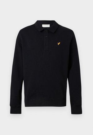 Schwarzes langärmeliges Poloshirt mit drei Knöpfen und einem kleinen gelben Vogel-Logo auf der linken Brust vor einem einfarbigen Hintergrund.