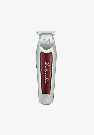 Wahl cordless hair detailer trimmer with silver body, red grip panel, and precision T-shaped cutting blade.