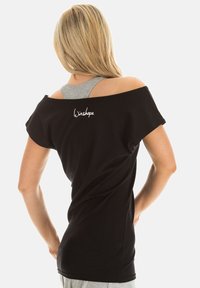 Black off-the-shoulder top with short sleeves, featuring a gray underside and white "Winshape" logo on the back, made from soft fabric.