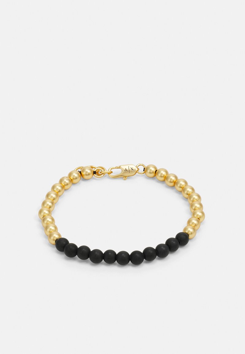 Kralenarmband met afwisselend gouden metallic en zwarte matte bollen, met een gouden sluiting en een gladde textuur.
