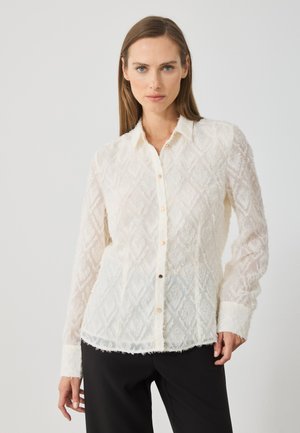 Bluza z gumbi - erget