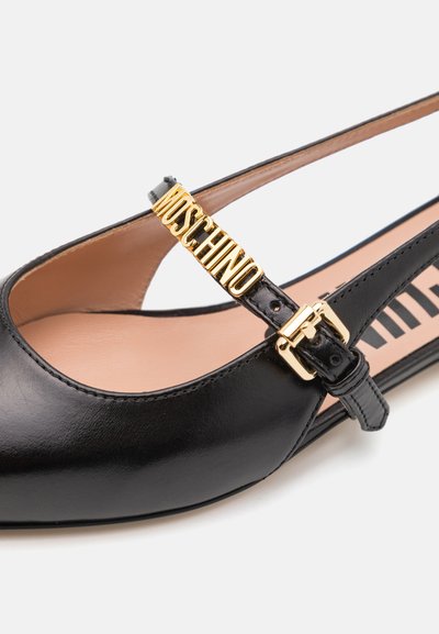 MOSCHINO Pahkluurihmadega baleriinad - nero