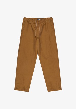 Bruine, lichtgewicht broeken van zacht materiaal met een elastische tailleband en trekkoord. Voorzien van zijzakken en een taps toelopend ontwerp.