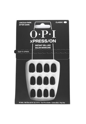 Kit d'ongles autocollants comprenant 30 ongles noirs en gel, emballés avec une base blanche, de la colle à ongles, une lime double face, un polissoir, un bâton de cuticules et un pad de préparation.