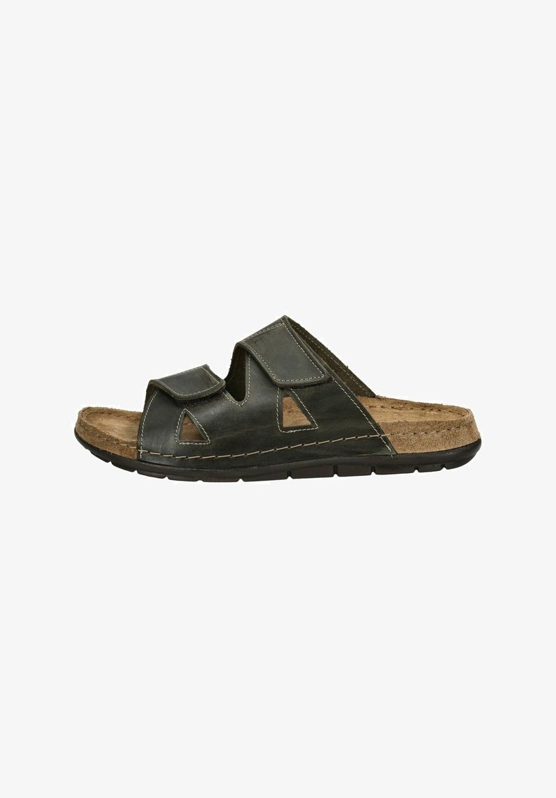 Černé kožené sandály s korkovou stélkou, otevřený design se zdobenými výřezy, prošívané detaily a texturovaná gumová podrážka.