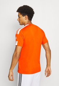 adidas Performance SQUAD 21 - Camiseta estampada - teaora/white