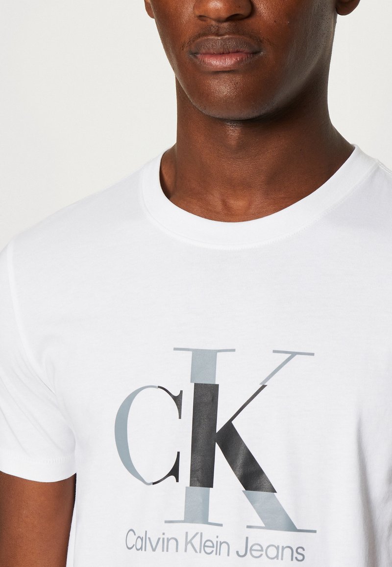 Calvin Klein DISRUPTED MONOLOGO TEE Camiseta estampada - bright white/blanco -