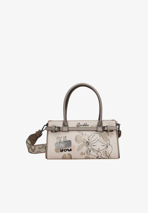 Borsa rettangolare beige con manici marroni, scritta "Focus on you" e disegno di una ragazza che tiene una candela accesa sul davanti.