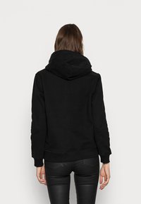 Tommy Hilfiger REGULAR SCRIPT HOODIE - Felpa - black