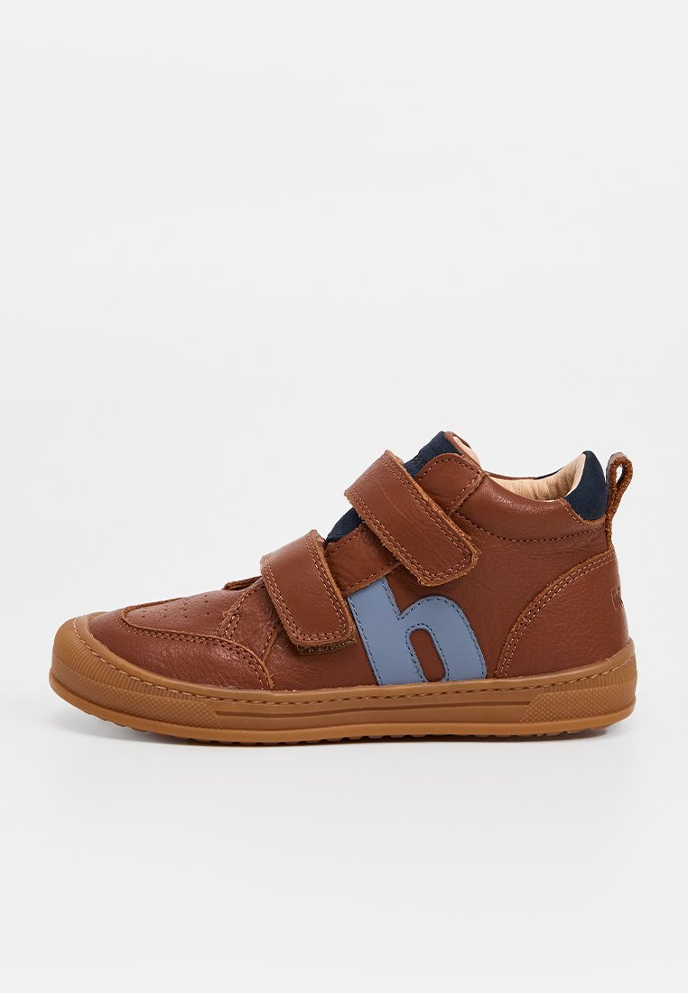 Brown leather high-top sneakers with two Velcro straps, navy accents, perforated toe, and a blue "h" detail on the side. Rubber sole.