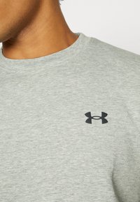 Under Armour UNSTOPPABLE FLEECE - Sportinis megztinis - mod gray