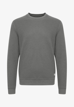 Grijze sweatshirt met een gestructureerd waffle-breisel, ronde hals en ribbelboorden aan de mouwen en onderkant. Klein logotag aan de onderzijde.