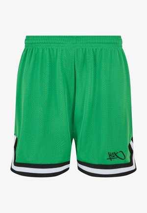 Roheline võrkkangas spordilühikesed püksid, millel on musta ja valge äärisega. Pükstel on tekstuuriline disain ja logo alumises nurgas.