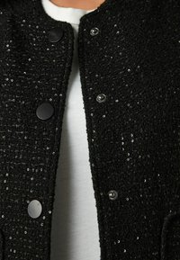Next SEQUIN - Skraistė  - black