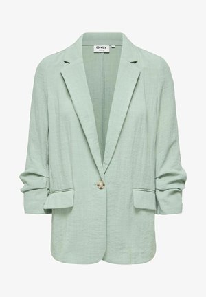 Világoszöld struktúrált blézer bevágott hajtókákkal, egysoros gombolással, hosszú, fodrozott ujjakkal és hajtókás zsebekkel mindkét oldalon.