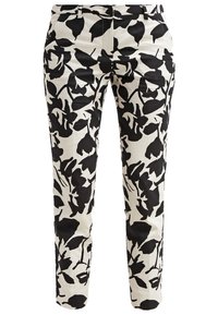 Pantalon slim à motif floral noir sur fond blanc, avec passants pour ceinture et poches avant.